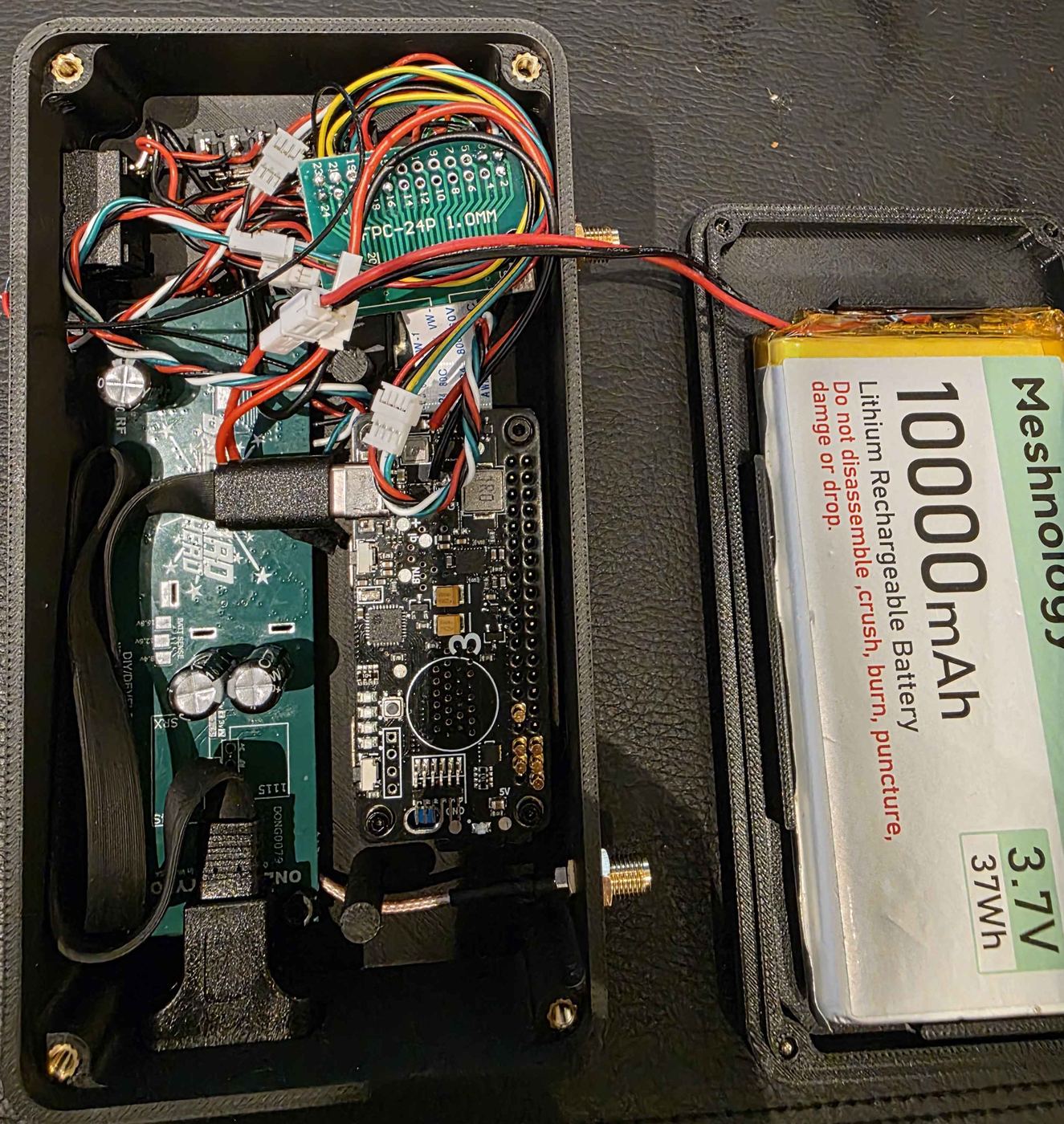 libpyro transmitter internals: RF board, Pi Zero, and battery in a 3D-printed enclosure